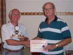 The monthly winner Mick Adams receiving his certificate from John Johnson